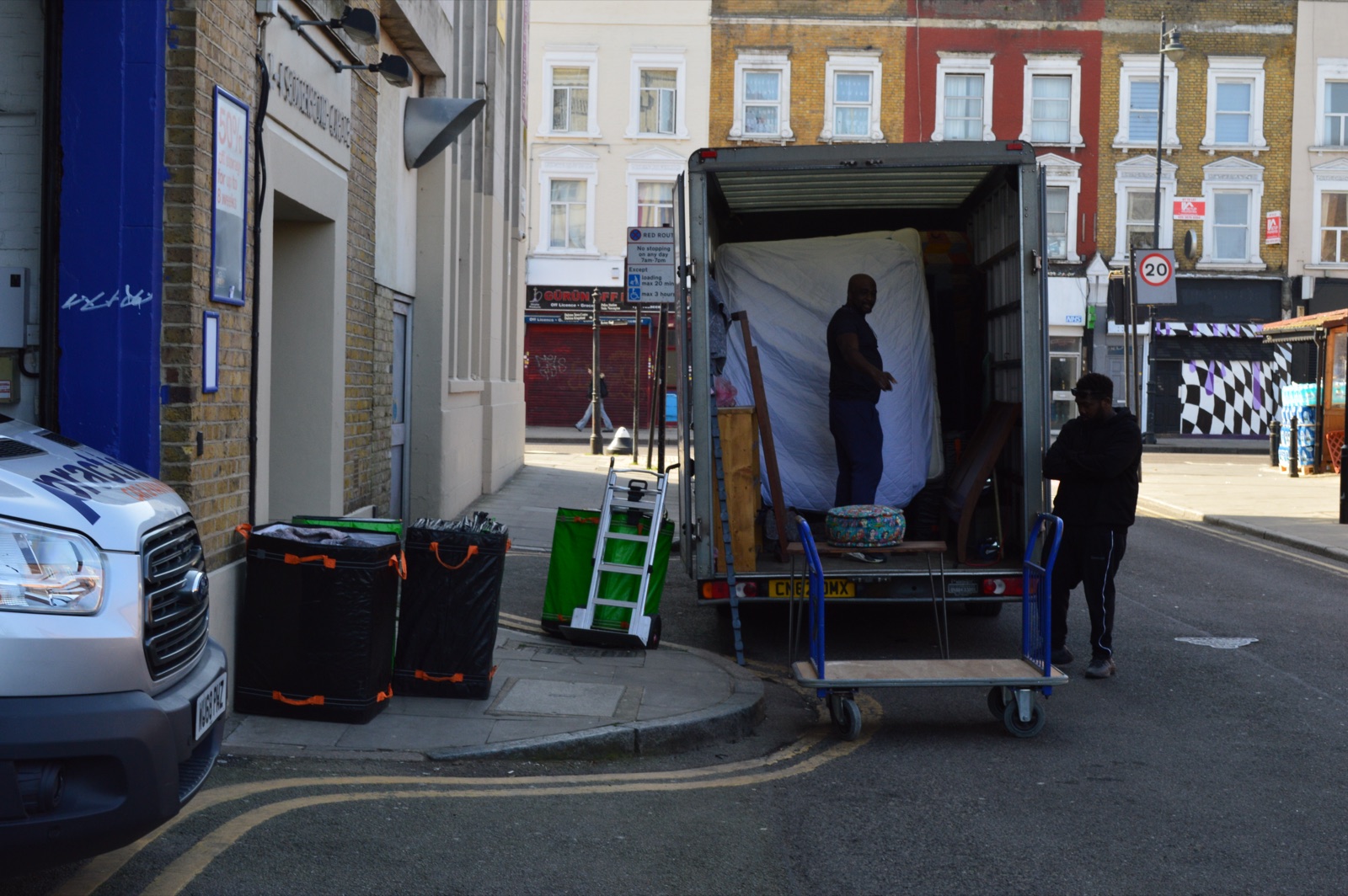 Loaded Luton van parked on the street ready for transport